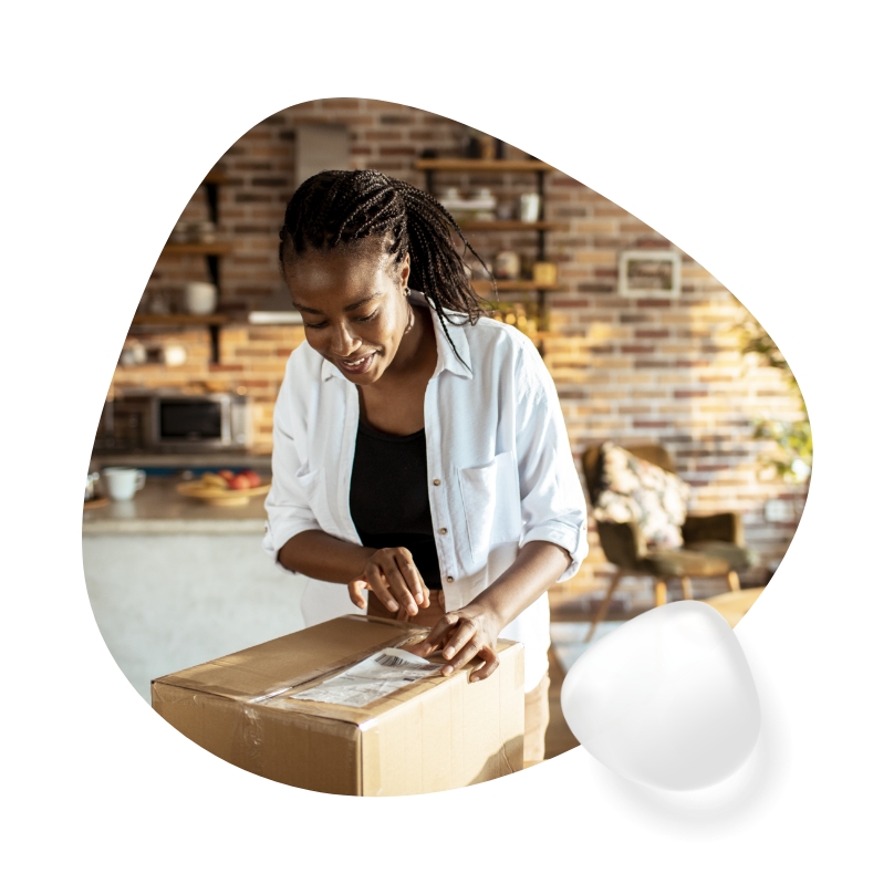 A woman opens a package